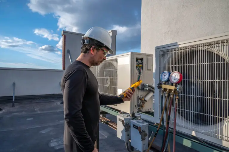 Expert technician from Weather Tech Services, one of the top AC companies near you, servicing an AC unit
